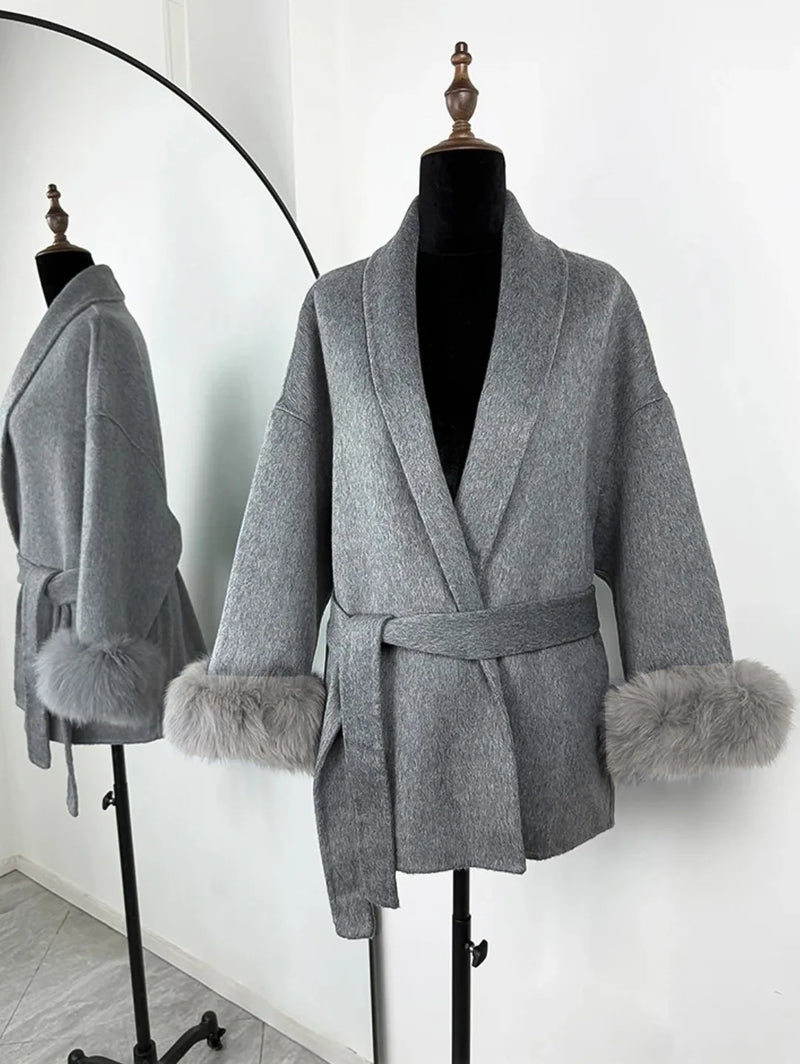 PLUSH COAT WITH LAPEL AND BELT.