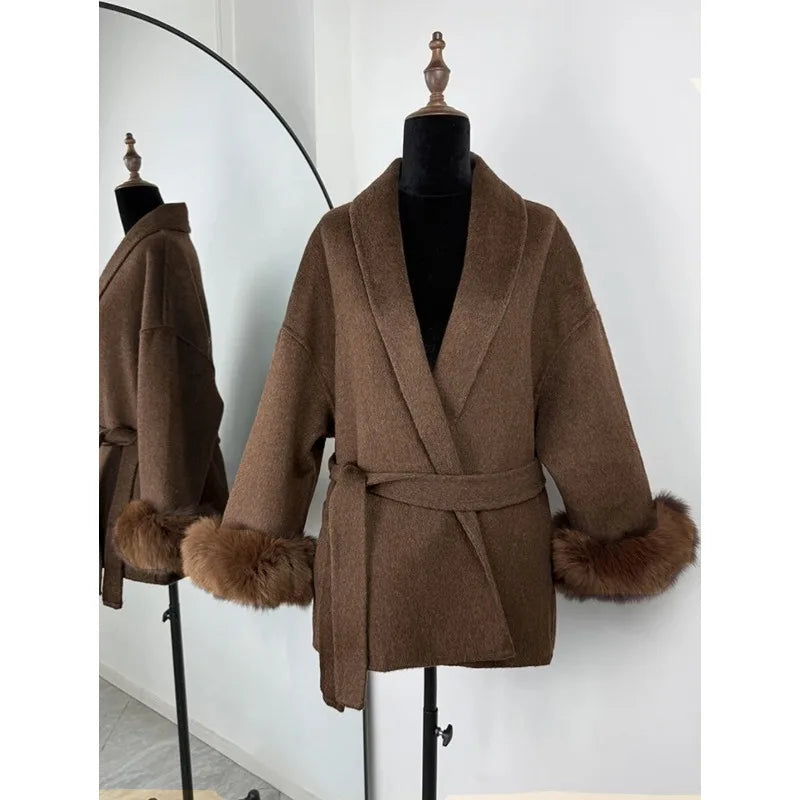 PLUSH COAT WITH LAPEL AND BELT.