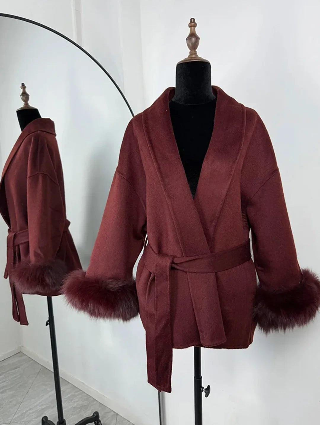 PLUSH COAT WITH LAPEL AND BELT.
