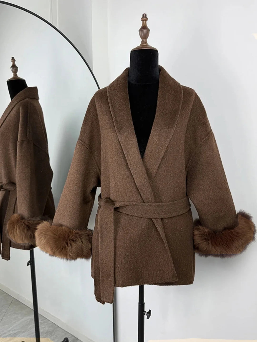 PLUSH COAT WITH LAPEL AND BELT.