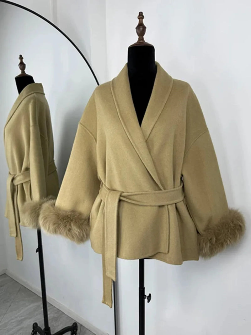 PLUSH COAT WITH LAPEL AND BELT.