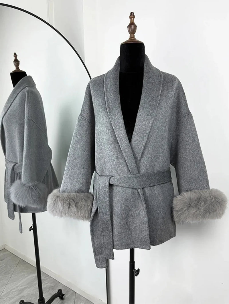 PLUSH COAT WITH LAPEL AND BELT.