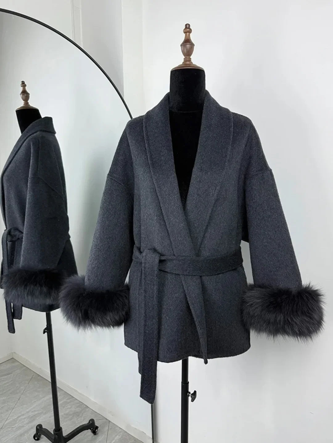 PLUSH COAT WITH LAPEL AND BELT.