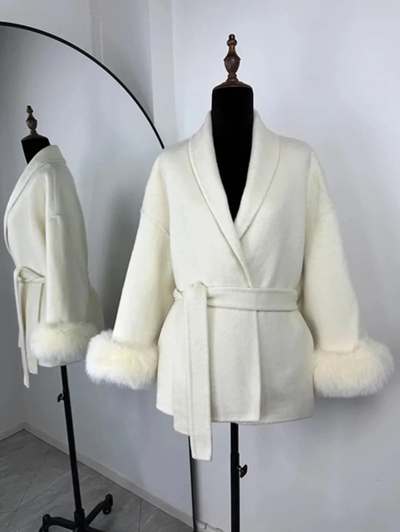 PLUSH COAT WITH LAPEL AND BELT.