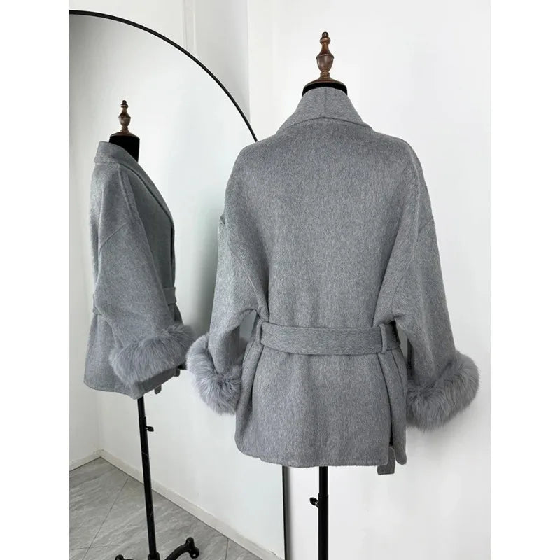 PLUSH COAT WITH LAPEL AND BELT.